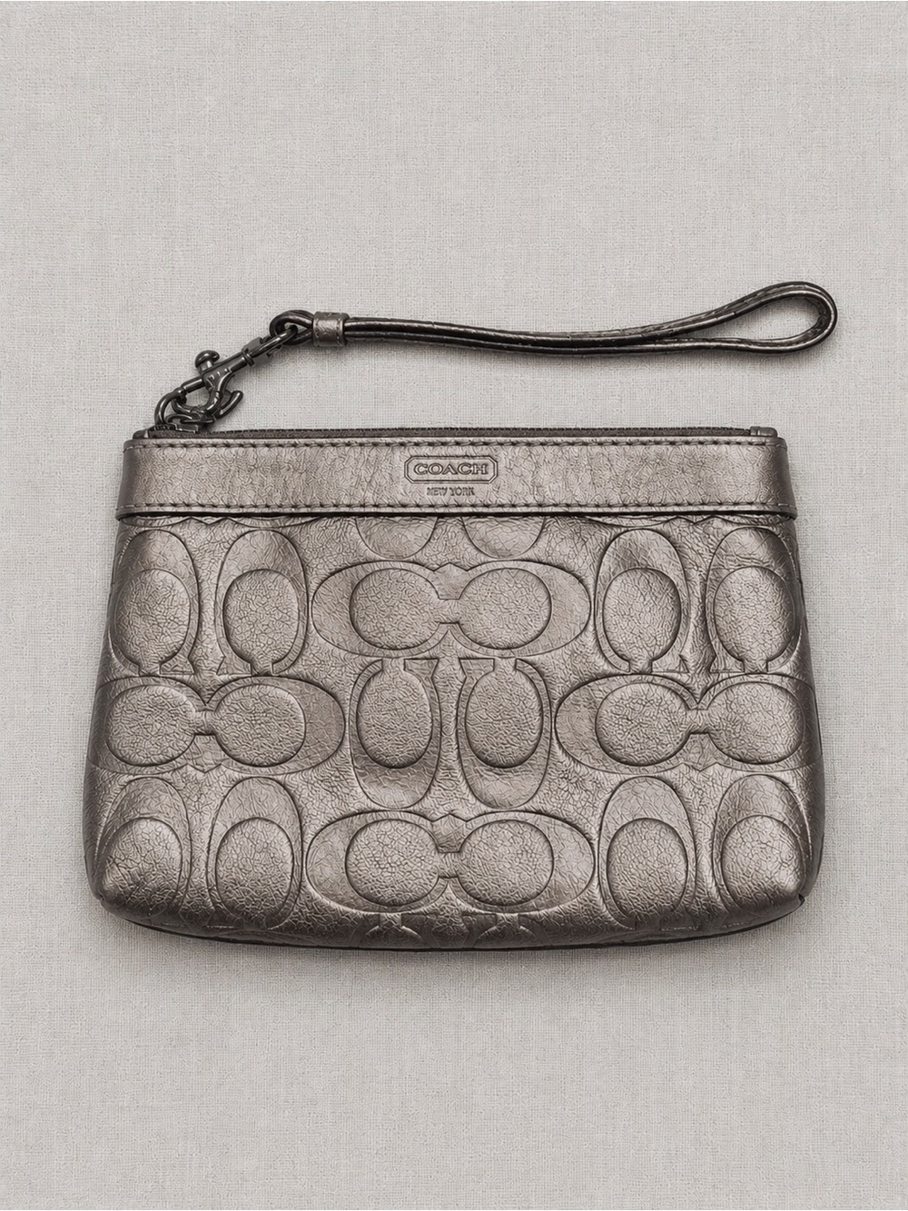 Coach Embossed Metallic Silver Signature Wristlet